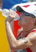 La canadienne Jill Savege de Penticton, C-B a termin 39e au triathlon fminin aux Jeux olympiques  Athnes le mercredi 25 aot 2004.  (CP PHOTO/COC/Andre Forget)