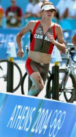 Simon Whitfield of Victoria, B.C., runs during the Triathlon event at  the Athens 2004 Summer Olympic Games Thursday August 26, 2004. (CP PHOTO/COC-Andre Forget)