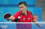 Canada's Johnny Huang of Toronto hits a shot during his loss to Aleksandar Karakasevic of Serbia and Montenegro in men's table tennis at the Summer Olympic Games in Athens, Greece, Monday, August 16, 2004. (CP PHOTO/COC/Mike Ridewood)