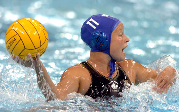Canadian Valerie Dionne calls out to pass the ball during Waterpolo action against Russia during the Athens 2004 Summer Olympic Games August 16, 2004. (CP PHOTO 2004/Andre Forget/COC)