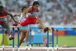 Canada's Angela Whyte of Edmonton, Alberta, in her heat of women's 100 metre hurdles in track and field action at the Olympic Games in Athens, Sunday, August 22, 2004. She finished sixth overall. (CP PHOTO)2004(COC-Mike Ridewood)
