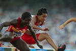 Canada's Angela Whyte of Edmonton, Alberta, in her heat of women's 100 metre hurdles in track and field action at the Olympic Games in Athens, Sunday, August 22, 2004. She finished sixth overall. (CP PHOTO)2004(COC-Mike Ridewood)