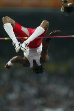 Canada's Mark Boswell of Brampton, Ont. waves at the crowd after finishing seventh in the men's high jump final in track and field action at the Athens Olympics, Sunday, Aug. 22, 2004. (CP PHOTO/COC-Mike Ridewood)