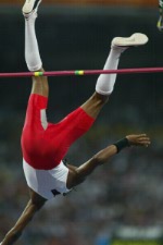 Canada's Mark Boswell of Brampton, Ont. waves at the crowd after finishing seventh in the men's high jump final in track and field action at the Athens Olympics, Sunday, Aug. 22, 2004. (CP PHOTO/COC-Mike Ridewood)