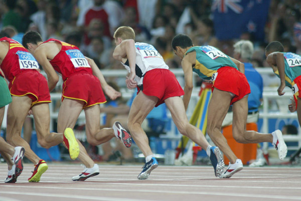 Canada's Kevin Sullivan (#132) of Brantford, Ont. failed to qualify in the men's 1500 metres in track and field action at the Athens Olympics, Sunday, August 22, 2004.(CP PHOTO/COC-Mike Ridewood)