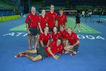 Canada's 2004 badminton team at the Olympic Games in Athens.  Standing (left to right): Jean-Paul Girard (coach), Anna Rice, Mike Beres and Martha Deacon (team leader).  Kneeing (left to right): Helen Nichol, Jody Patrick, Denyse Julien and Charmaine Reid.  Lying down: Philippe Bourret.(CP PHOTO)2004(COC-Mike Ridewood)