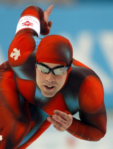 Canadian speed skater Patrick Bouchard skates during men's 1,000 metre speed skating in Salt Lake City, Utah Saturday Feb. 16, at the 2002 Olympic Winter Games. (CP Photo/COA/Andre Forget).
