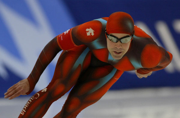 Canadian speed skater Patrick Bouchard skates during men's 1,000 metre speed skating in Salt Lake City, Utah Saturday Feb. 16, at the 2002 Olympic Winter Games. (CP Photo/COA/Andre Forget).