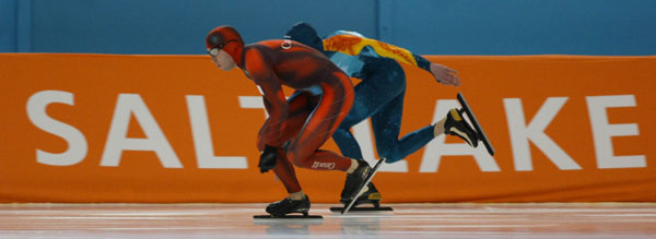 Canadian long-track speed skater Eric Brisson of Ste-Foy, Que. races during his 500-metre heat in Salt Lake City, Utah Tuesday Feb. 12, at the 2002 Olympic Winter Games. (CP Photo/COA/Andre Forget).
