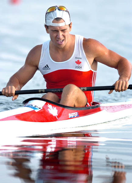 Canada's Adam van Koeverden of Burlington, Ontario reacts after crossing the line after the K1 final during the Athens 2004 Summer Olympic Games in Schinias, Greece, on Friday, August 27, 2004. van Koeverden came in third for a bronze medal. (CP PHOTO 2004/Andre Forget/COC)