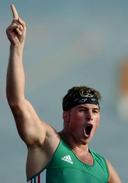 Hungary's Attila Vajda celebrates his third place  and bronze medal after paddling the C1 1000m final during the Athens 2004 Summer Olympic Games on Friday, August 27, 2004. Canada's Giles came in fifth.  (CP PHOTO/COC-Andre Forget)