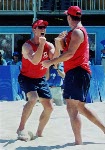Canada's John Child and Mark Heese get excited after winning a round of beach volleyball at the 2000 Sydney Olympic Games. (CP Photo/ COA)