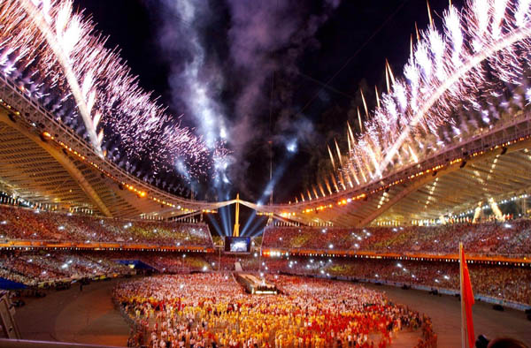 Fireworks light up the Olympic stadium during closing ceremonies of the Olympic Summer Games  in Athens, Sunday, August 29, 2004. (CP PHOTO/COC-Andre Forget)