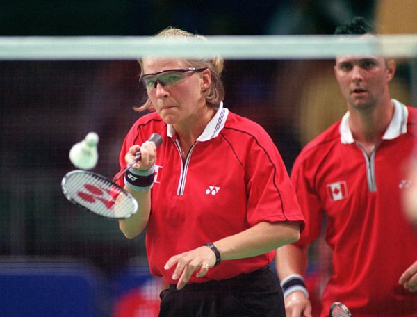 Canada's  Milaine Cloutier and Bryan Moody compete together in a mixed pairs badminton match at the Sydney 2000 Olympic Games.(CP PHOTO/ COA)