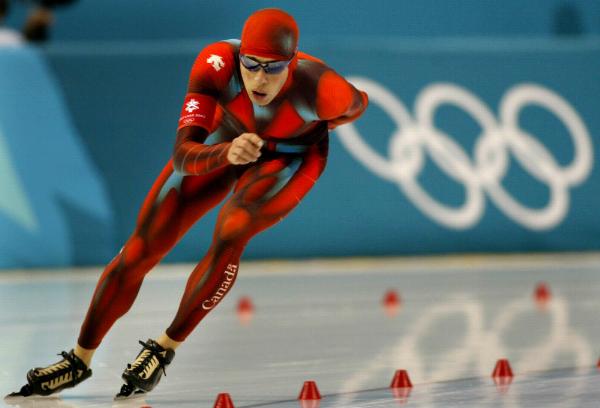 Team Canada's long track speed skater Dustin Molicki powers on to beat teammate Mark Knoll for the Canadian record with a time of 6:26.29 in the 5,000 metre mens final at the Olympic Winter Games in Salt Lake City, Utah Saturday Feb 9, 2002. (CP Photo/HO/