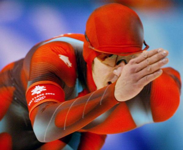 Team Canada's Olympic long track speed skater Mark Knoll skates during his Canadian record race of 6:30.63 in the 5,000 metre mens final at the Olympic Winter Games in Salt Lake City, Utah Saturday Feb 9, 2002. (CP Photo/HO/COA/Andre Forget)