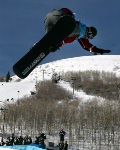 Canada's Brett Carpentier of Mont-Tremblant, Que. pulls a trick while riding the half pipe at Park City, Utah Monday  Feb. 11, 2002 at the Salt Lake City 2002 Winter Olympics. (CP Photo/HO/COA/Andre Forget)