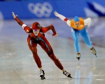 Clara Hughes (left) of Winnipeg skates against Daniela Anschuetz of Germany in the women's 3,000 metre speed skating in the Winter Olympics at the Utah Olympic Oval in Salt Lake City, Sun., Feb. 10, 2002. Hughes finished tenth and Anschuetz twelth. (CP Ph