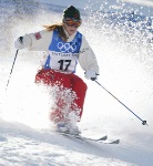 Canada's Tami Bradley, of Vancouver, sprays snow during Olympic moguls training at Deer Valley, Utah, Tuesday Feb. 5, 2002. (CP PHOTO/HO-COA-Mike Ridewood)