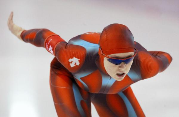 Canada's Cindy Klassen of Winnipeg skates to a bronze medal in the women's 3,000 metre speed skating in the Winter Olympics at the Utah Olympic Oval in Salt Lake City, Sunday Feb. 10, 2002. (CP Photo/HO/COA/Mike Ridewood)
