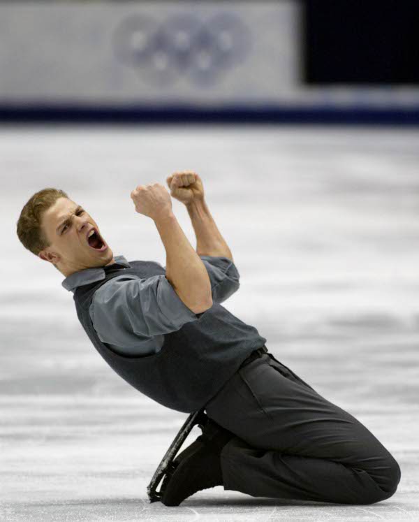 Canadian David Pelletier yells out after completing his Pairs Free Skating with Jamie Sale (not shown) in Salt Lake City, Utah Monday Feb. 11, at the 2002 Winter Olympics. They won a Silver medal for their skate. (They will be co-awarded the gold later on after an ISU's decision.) (CP Photo/HO/COA/Andre Forget)