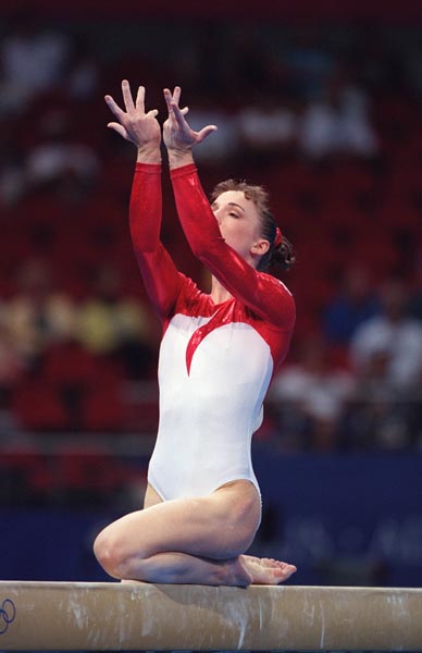Canada's Lise Leveille performs on the beam during gymnastics competition at the Sydney 2000 Olympic Games. (CP Photo/COA)