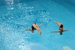 Blythe Hartley (L) and team mate Emilie Heymans get ready to dive during the Synchronised Diving 3m Springboard at the Athens 2004 Summer Olympic Games August 14, 2004.  The pair finished seventh.. (CP PHOTO 2004/Andre Forget/COC)