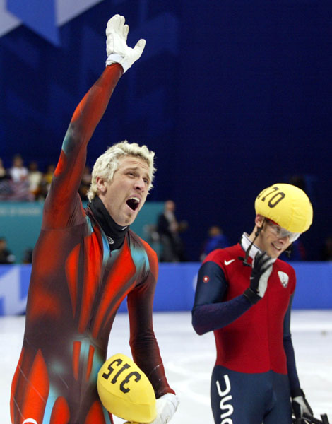 Canadian speed skater Marc Gagnon waves the crowd after the Men's 500 metre at the 2002 Olympic Winter Games in Salt Lake City. Gagnon went on to win the gold medal. (CP Photo/COA/Andre Forget).