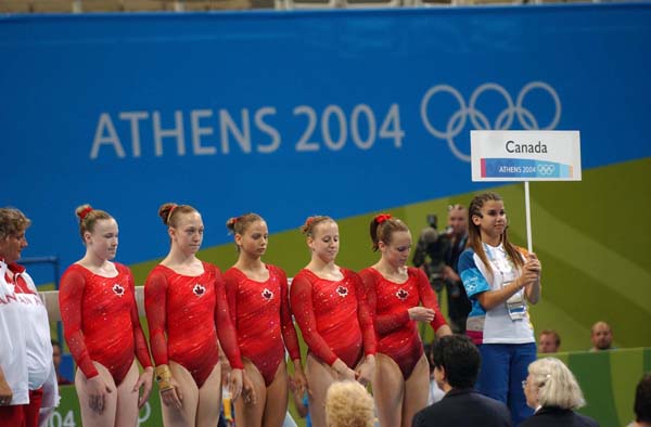 Canada's women's artistic gymnastics team before beginning their qualification at the Olympic Games in Athens on August 15, 2004. From left to right: Heather Purnell, Kylie Stone, Gael Mackie, Melanie Banville, and Kate Richardson. (CP PHOTO 2004/Andre Forget/COC)