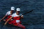 Canada's Caroline Brunet (left) and Mylanie Barre race in the K2 500m heat at the Athens 2004 Summer Olympic Games Tuesday August 24, 2004. The pair placed third in the heat. (CP PHOTO/COC-Andre Forget)