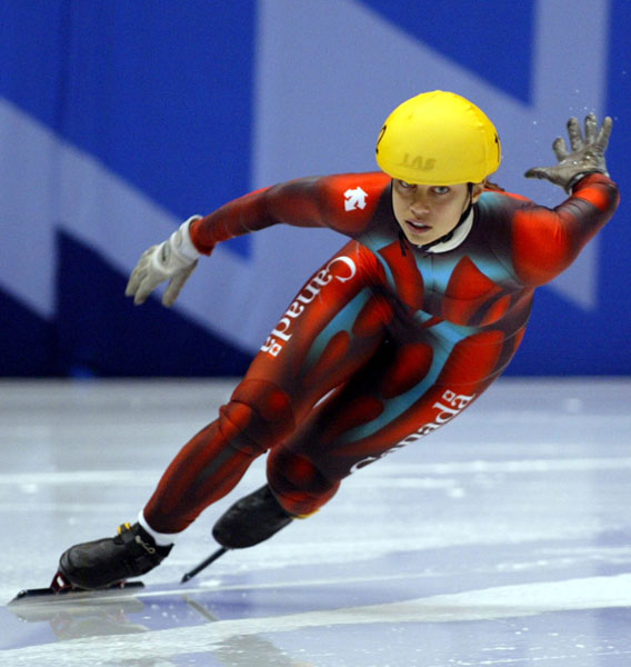 Alanna Kraus of Abbotsford, B.C. skates to the finish in the 1,500 meter final at the Olympic Winter Games in Salt Lake city, Wednesday February 13, 2002. Kraus who fell during the race competed in the 500 meter and 1,000 meter events. (CP PHOTO/COA/Andr Forget).