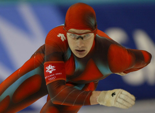 Canadian speed skater Kevin Marshall skates during the Men's 1000 meter in Salt Lake City, Utah Saturday Feb. 16, at the 2002 Olympic Winter Games. (CP Photo/COA/Andre Forget).