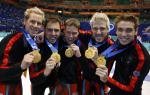 Canadian Short Track Gold medallists (L-R) Jonathan Guilmette, Eric Bedard, Mathieu Turcotte, Marc Gagnon, Francois-Louis Tremblay celebrate after winning gold in the Men's 5000 metre Relay Saturday Feb. 23, 2002 at the 2002 Olympic Winter Games in SaltLake City. (CP Photo/COA/Andre Forget).