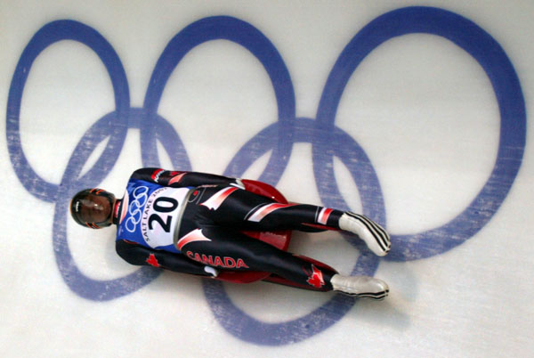 Canadian Chris Moffat slides down the track during Men's Singles in Park City, Utah Sunday Feb. 10, 2002 at the 2002 Olympic Winter Games in Salt Lake City. (CP Photo/COA/Andre Forget).