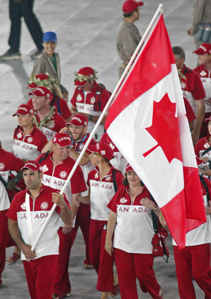 Nicolas Gill of Montreal leads the Canadian team into the opening ceremonies of the Athens Olympics, Friday, August 13, 2004.  (CP PHOTO/COC-Mike Ridewood)