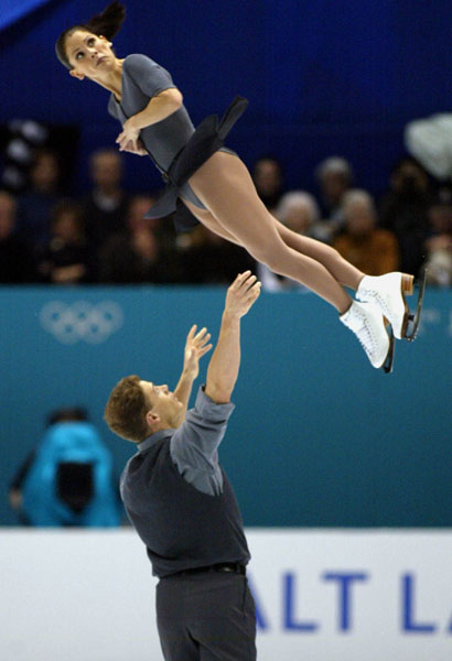 Jamie Sal is thrown by her partner David Pelletier during the pairs free skate at the 2002 Olympic Winter Games in Salt Lake City, Monday Feb. 11, 2002. (CP PHOTO/COA/Andr Forget).
