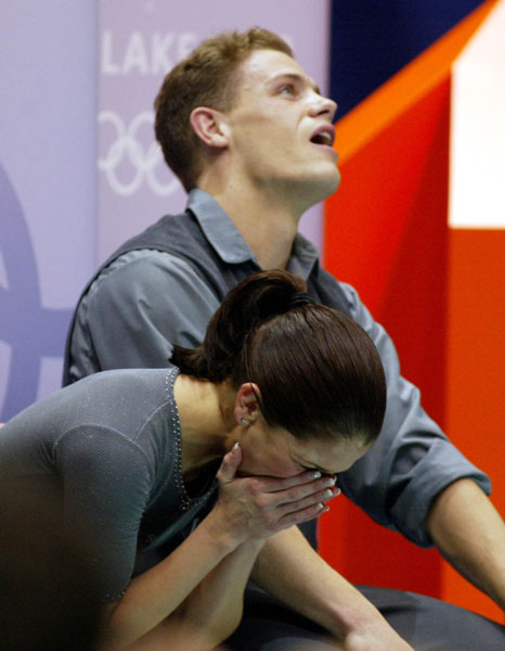 Canadians David Pelletier and Jamie Sale react after hearing their marks after completing their Pairs Free Skating in Salt Lake City, Utah Monday Feb. 11, at the 2002 Olympic Winter Games. (CP Photo/COA/Andre Forget).