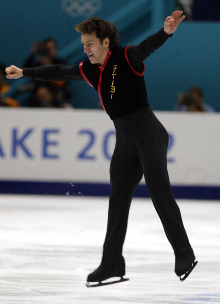 Canadian Figure Skater Elvis Stojko performs jumps during the men's short program in Salt Lake City, Utah Tuesday Feb. 12, at the 2002 Olympic Winter Games. (CP Photo/COA/Andre Forget).