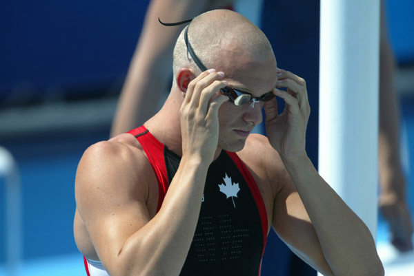 Brian Johns of Richmond, B.C. gets ready to swim in preliminaries of the 200 metre freestyle relay at the  Olympic Games in Athens, Tuesday, August 17, 2004. (CP PHOTO/COC-Mike Ridewood)