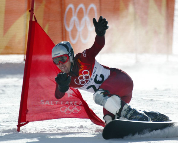Jerome Sylvestre, of Bromont, Que., races down the slalom course during the men's parallel giant slalom qualifications in Park City, Utah, Thursday Feb. 14, at the 2002 Olympic Winter Games. Sylvestre went on to qualify for the finals. (CP PHOTO/COA/Andre Forget).