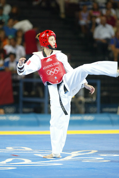 Canada's Ivett Gonda from Port Moody, B.C. competes in the under 49kg taekwondo repechage at the Summer Olympic Games in Athens, Greece on Thursday August 26, 2004. (CP PHOTO/COC/Mike Ridewood)