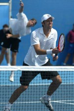 Daniel Nestor of Willowdale, Ont. in the first round of doubles tennis against Slovakia at the Olympic Games in Athens, Sunday, August 15, 2004. (CP PHOTO/COC-Mike Ridewood)