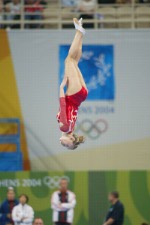 Canada's Karen Cockburn of Toronto jumps to a silver medal in women's trampoline at the Olympic Games in Athens on Friday, August 20, 2004. (CP PHOTO)2004(COC-Mike Ridewood)