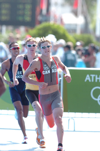Canada's Brent McMahon of Victoria, B.C., runs in the Triathlon event at the 2004 Summer Olympic Games in Athens on Thursday August 26, 2004. McMahon came in 39th. (CP PHOTO/COC-Andre Forget)