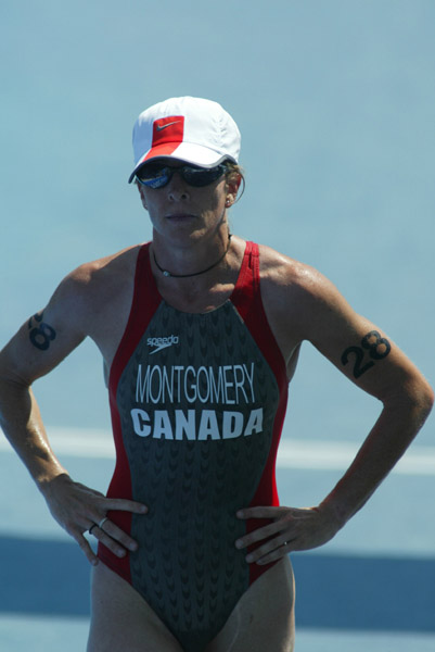 La canadienne Carol Montgomery de Vancouver a termin au 35e rang au triathlon fminin aux Jeux olympiques  Athnes le mercredi 25 aot 2004.  (CP PHOTO/COC-Mike Ridewood)