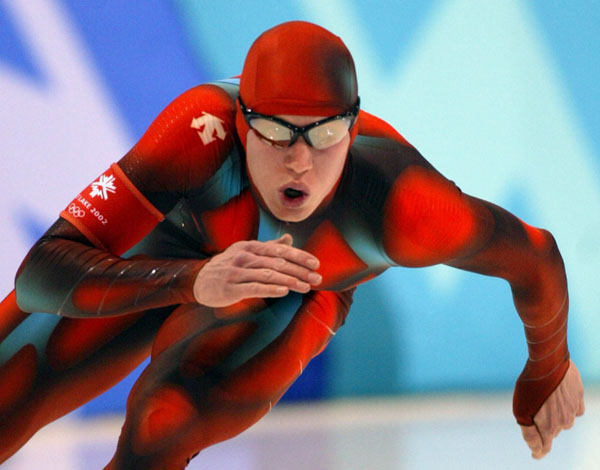Canadian speed skater Jeremy Wotherspoon skates round a corner during the Mens 1000 meter in Salt Lake City, Utah Saturday Feb. 16, at the 2002 Olympic Winter Games. (CP Photo/COA/Andre Forget)