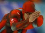 Canadian speed skater Jeremy Wotherspoon skates round a corner during the Men's 1000 meter in Salt Lake City, Utah Saturday Feb. 16, at the 2002 Olympic Winter Games. (CP Photo/COA/Andre Forget)