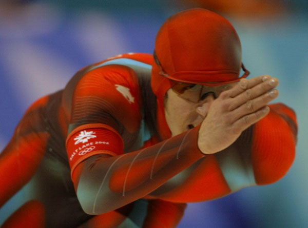 Canadian speed skater Jeremy Wotherspoon skates around a corner during the Men's 1000 meter in Salt Lake City, Utah Saturday Feb. 16, at the 2002 Olympic Winter Games. (CP Photo/COA/Andre Forget)