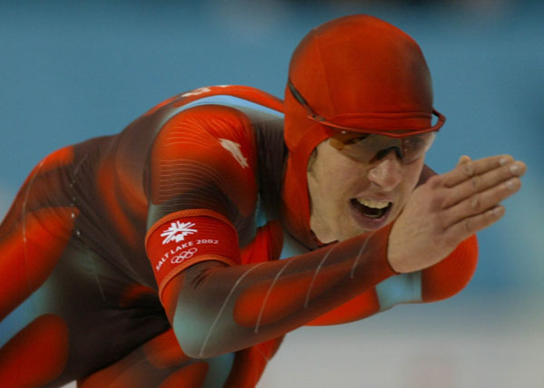 Canadian speed skater Jeremy Wotherspoon skates around a corner during the Men's 1000 meter in Salt Lake City, Utah Saturday Feb. 16, at the 2002 Olympic Winter Games. (CP Photo/COA/Andre Forget)