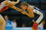 Canada's wrestler Christine Nordhagen congratulates her opponent at the Olympic Games in Athens on August 23, 2004.  Nordhagen finished fifth. (CP PHOTO)2004(COC-Mike Ridewood)